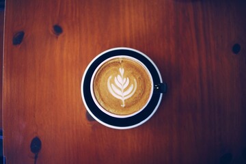 coffee cup on wooden background