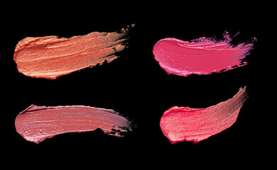 Ruby pearl red pink violette orange lipstick isolated on black background texture smudged