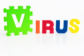 Close up on colorful virus word on white background.