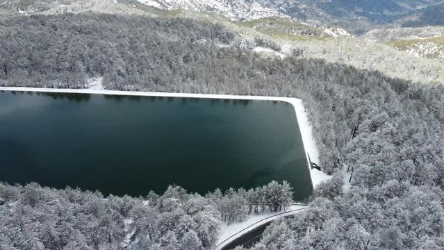 Rectangular lake in winter in the Troodos mountains in Cyprus