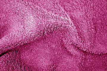 Fototapeta na wymiar Bath towel texture in pink color.