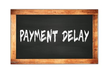 Obraz premium PAYMENT DELAY text written on wooden frame school blackboard.