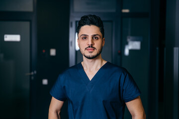 Portrait of turkish or arabian male nurse - obrazy, fototapety, plakaty