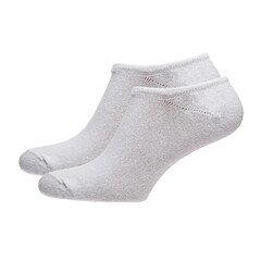 A pair of fabric socks stands on a white isolated background. Volumetric socks on a transparent mannequin.