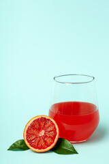 Concept of fresh drink with red orange juice
