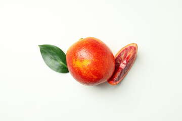 Concept of citrus with red orange on white background