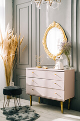 Interior of contemporary living room with dresser and vintage mirror on a wall. - obrazy, fototapety, plakaty