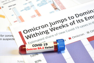 Blood tube for test detection of virus Covid-19 Omicron BA.2 Variant on papers documents. Italy