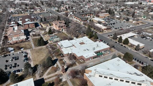 Aerial rural Snow College Ephraim Utah winter spring 2. Rural college university in Ephraim central Utah. Education, learning, sports and technical study. Early spring weather and climate. Campus.