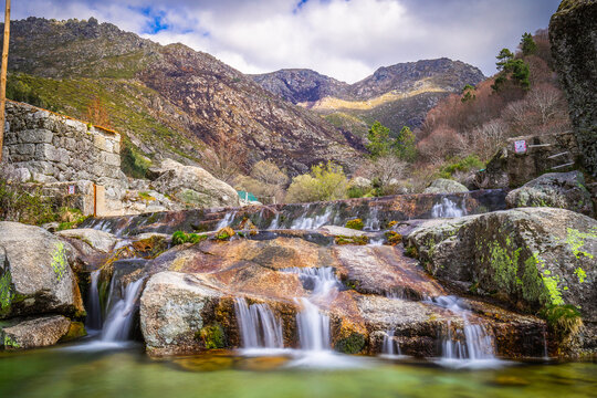 Natural swimming pools with rocks in the touristic place of Loriga, Serra da Estrela - Portugal. River pools at Loriga, Serra da Estrela - Portugal