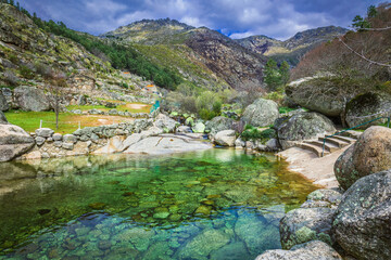 Natural swimming pools with rocks in the touristic place of Loriga, Serra da Estrela - Portugal. River pools at Loriga, Serra da Estrela - Portugal