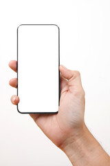 Front View of Man Holding Smart phone . Cell phone in Man hand on a white background With white display for COPY SPACE.