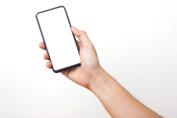 Front View of Man Holding Smart phone . Cell phone in Man hand on a white background With white display for COPY SPACE.