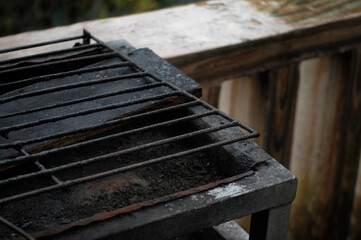 Fototapeta na wymiar a wood and iron grill