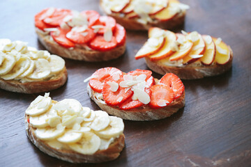 French toast with fruits isolated on white. Closeup view, selective focus
