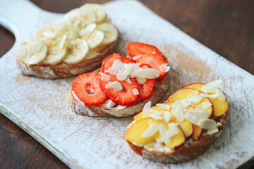 French toast with fruits isolated on white. Closeup view, selective focus
