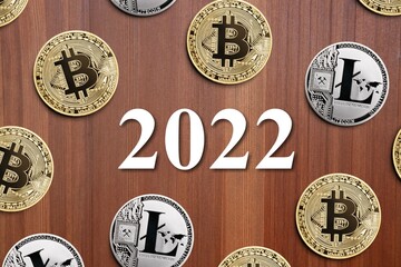 Cryptocurrency in 2022 price prediction, forecast concept. Golden crypto coins Bitcoin