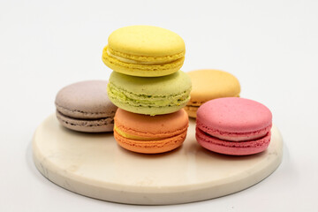 Macaroon dessert on white background. Colorful macarons. close up