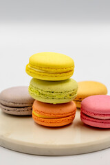 Macaroon dessert on white background. Colorful macarons. close up