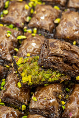 Pistachio Chocolate Baklava. Traditional Middle Eastern Flavors. Local name cikolatali baklava. close up.