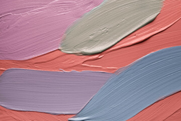 Cosmetic creamy multi colored mask purple blue green textured background