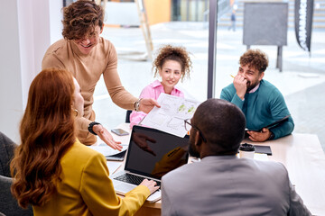hardworking business people having meeting in office, having talk, discuss, business team collaborating on project in office. in modern bright boadroom. business, successful cooperation