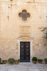 Fototapeta na wymiar The entrance to the Maronite church of St. Antonius in old part of Nazareth, northern Israel