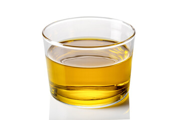 Extra virgin olive oil in glass cup on white background, clipping path