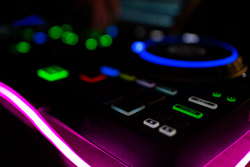 Fototapeta na wymiar DJ hands playing at the console.