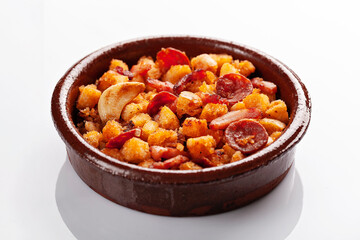 Migas manchegas on white background 