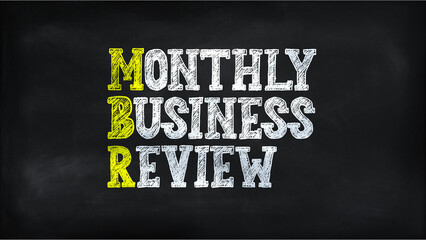 MONTHLY BUSINESS REVIEW (MBR) on chalkboard