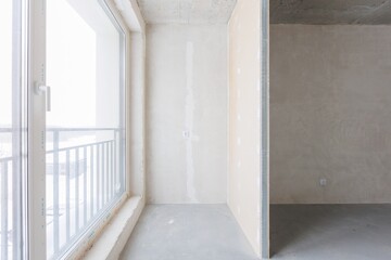 interior of the apartment without decoration in gray colors