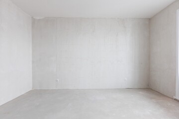 interior of the apartment without decoration in gray colors