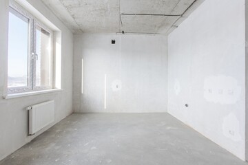 interior of the apartment without decoration in gray colors