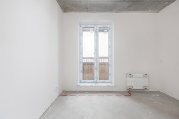 interior of the apartment without decoration in gray colors
