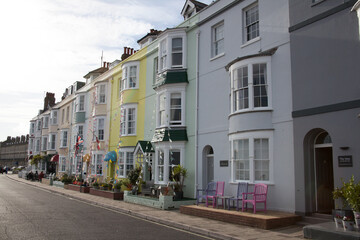 Fototapeta na wymiar Colourful houses on the beach front in Weymouth, Dorset in the UK