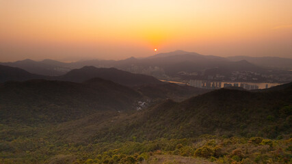 Fototapeta na wymiar sunset view of Wan Kok Shan, Sai Kung in Hong Kong with the townscape