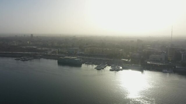 Aerial Drone shot of Luxor Corniche at Sunrise - Luxor, Egypt