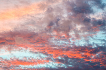 Colorful clouds over blue skies