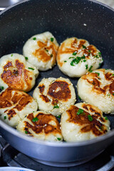 A plate of golden and tempting fresh pork fried buns