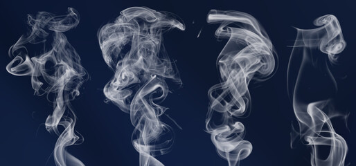 Beautifully colored, soft smoke floats in the air on a beautiful colored background. Abstract...