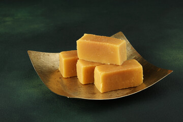 Mysore pak, a traditional, popular, and delicious sweet dish native to the city of Mysore,...