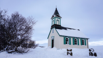 Fototapeta na wymiar White, wooden church at the heel