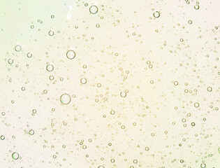 Liquid yellow gel on a digital screen abstract background