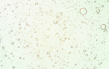 Liquid yellow gel on a digital screen abstract background