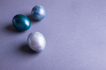 Red Easter eggs on a bright background. Easter background with eggs close up. Place for text.