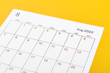 August 2022 calendar sheet on yellow background.