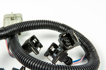 Modern automotive wiring for connecting auxiliary electronic systems of a car on a white background, electronic,