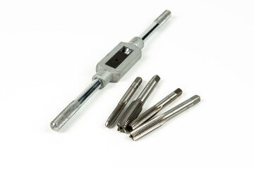 a set of professional tools for threading a hole in a repair