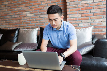 young handsome man in coffee shop